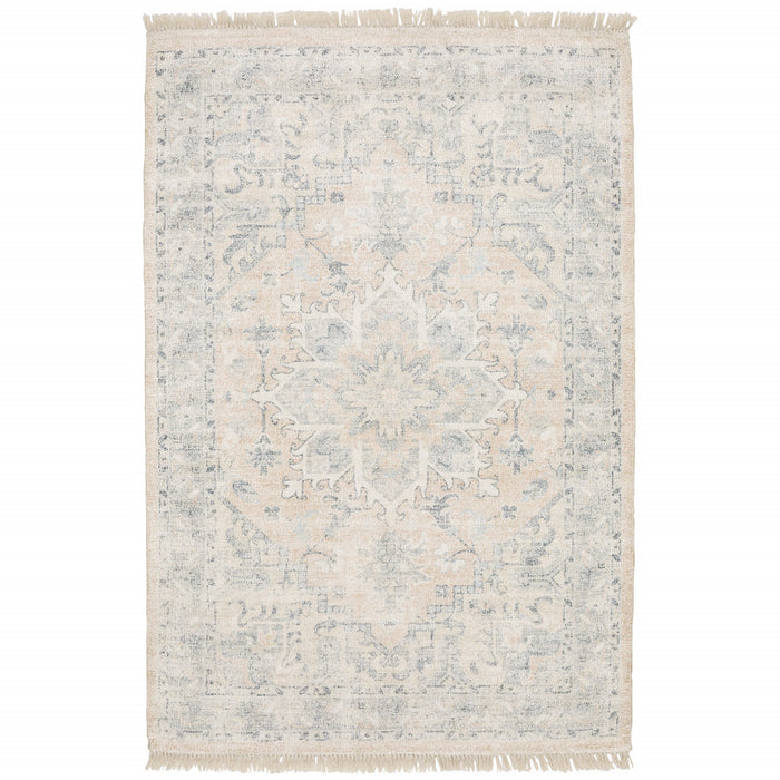 5' X 8' Beige And Grey Oriental Hand Loomed Stain Resistant Area Rug With Fringe