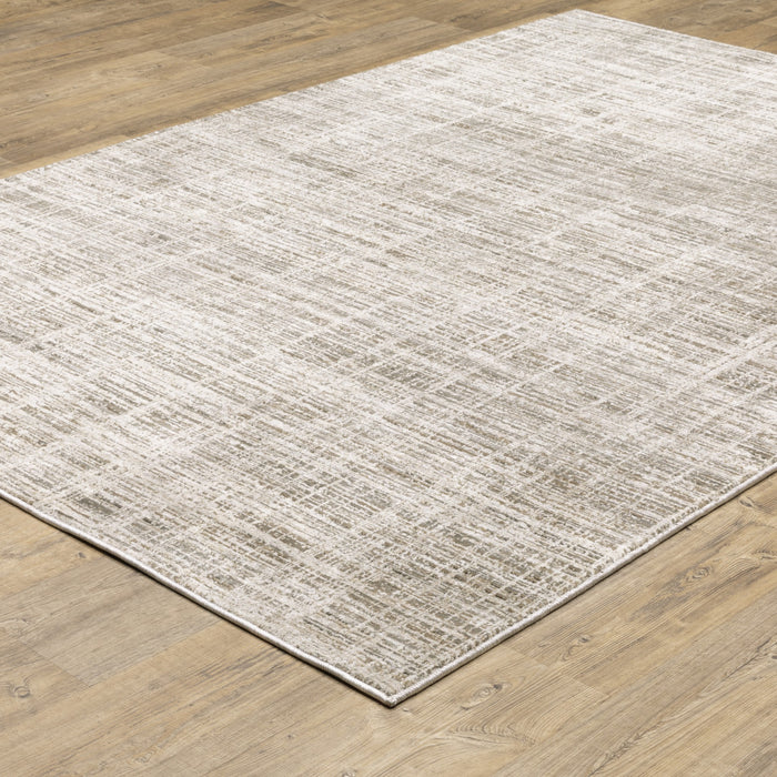 10' X 13' Beige Grey Ivory Tan And Brown Abstract Power Loom Stain Resistant Area Rug