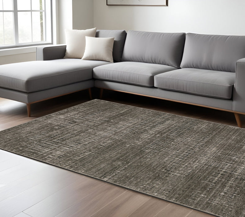 7' X 10' Gray and Ivory Abstract Power Loom Area Rug