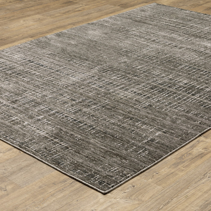 7' X 10' Gray and Ivory Abstract Power Loom Area Rug