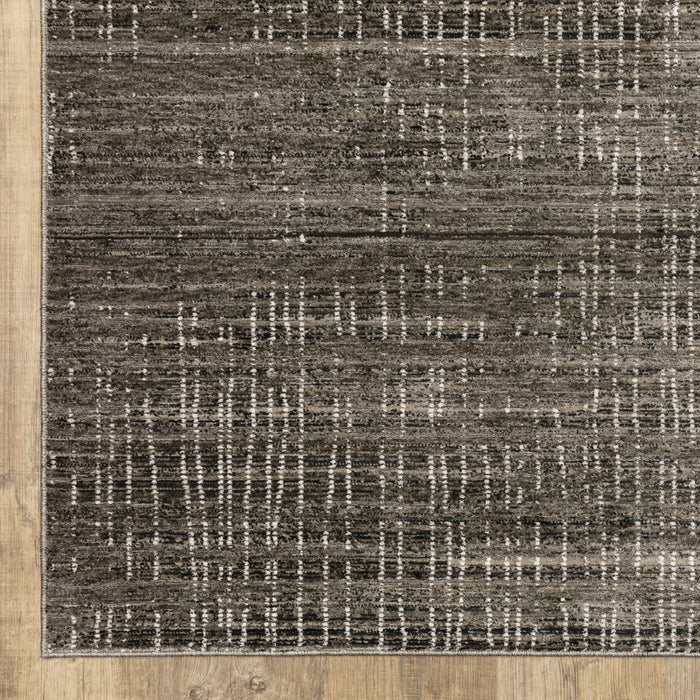 8' X 11' Charcoal Grey Grey Ivory Tan And Brown Abstract Power Loom Stain Resistant Area Rug