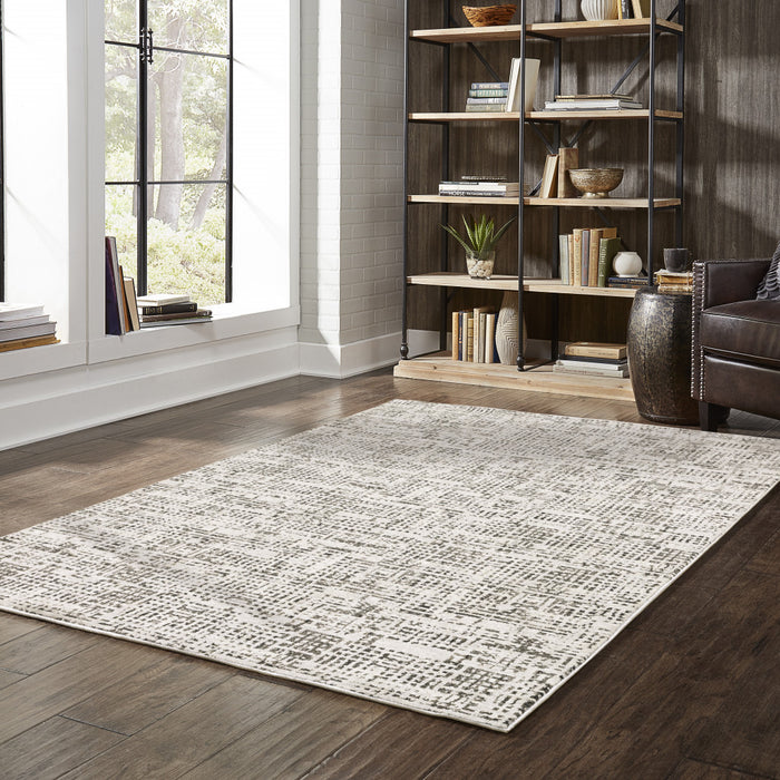 5' X 8' Ivory Grey Charcoal Brown And Beige Abstract Power Loom Stain Resistant Area Rug