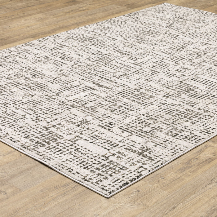 5' X 8' Ivory Grey Charcoal Brown And Beige Abstract Power Loom Stain Resistant Area Rug