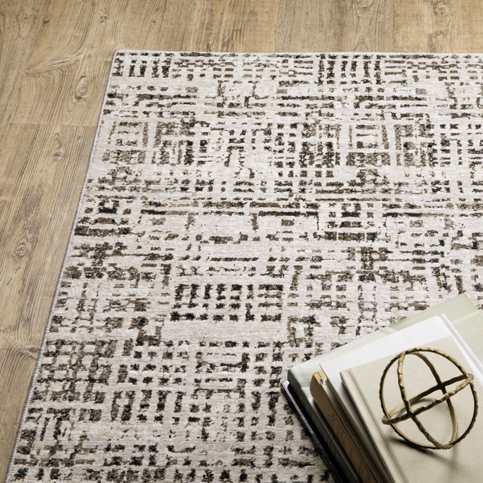 5' X 8' Ivory Grey Charcoal Brown And Beige Abstract Power Loom Stain Resistant Area Rug