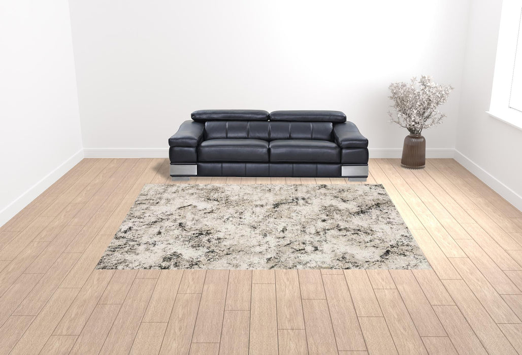 10' X 13' Ivory Grey Black Beige And Tan Abstract Power Loom Stain Resistant Area Rug