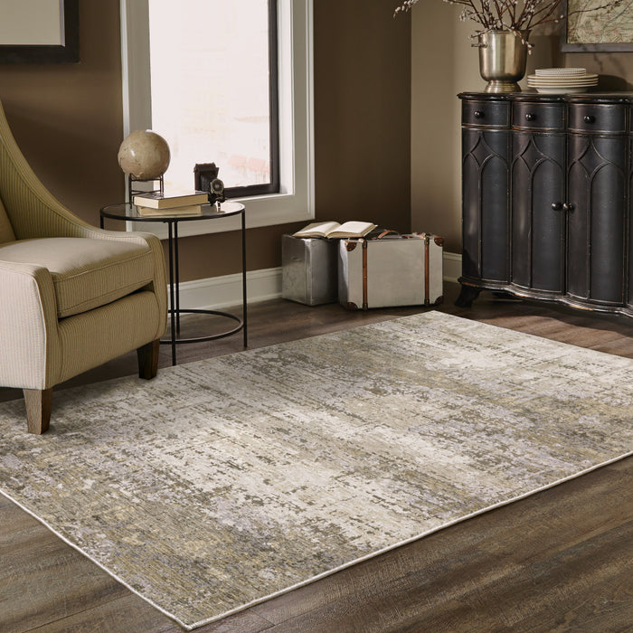 5' X 8' Beige Grey Ivory Tan And Brown Abstract Power Loom Stain Resistant Area Rug