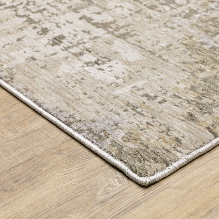 7' X 10' Beige and Ivory Abstract Power Loom Area Rug