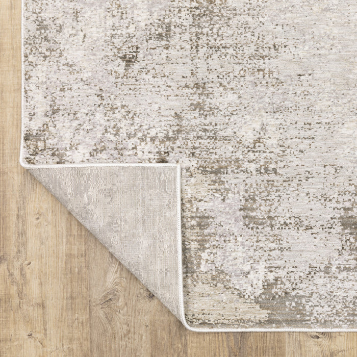 7' X 10' Beige and Ivory Abstract Power Loom Area Rug