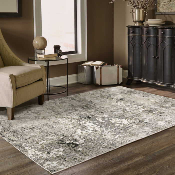 6' X 9' Grey Ivory Beige Charcoal Black Tan And Brown Abstract Power Loom Stain Resistant Area Rug