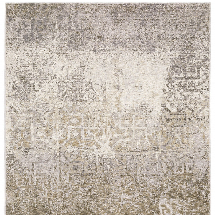 5' X 8' Ivory Grey Tan Brown And Beige Abstract Power Loom Stain Resistant Area Rug