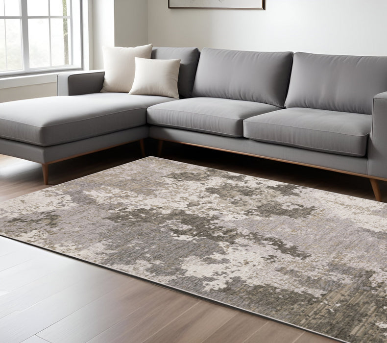 7' X 10' Gray and Ivory Abstract Power Loom Area Rug