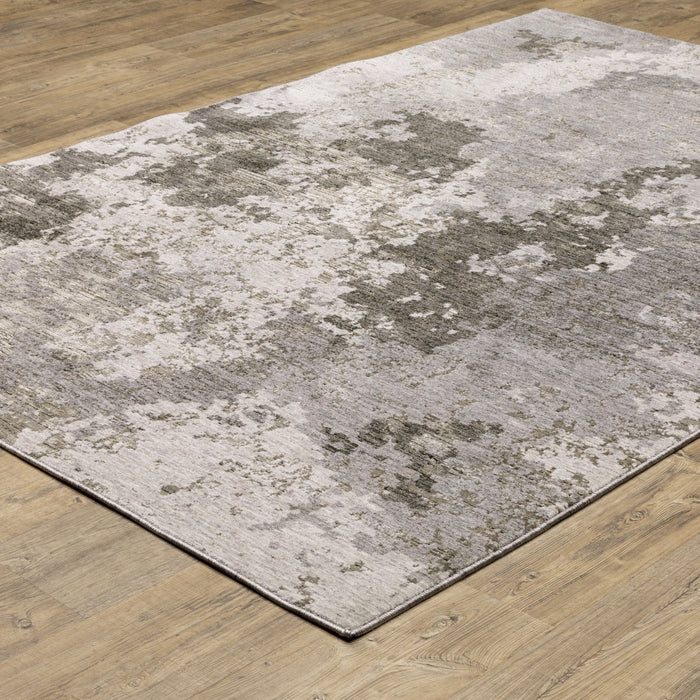 7' X 10' Gray and Ivory Abstract Power Loom Area Rug