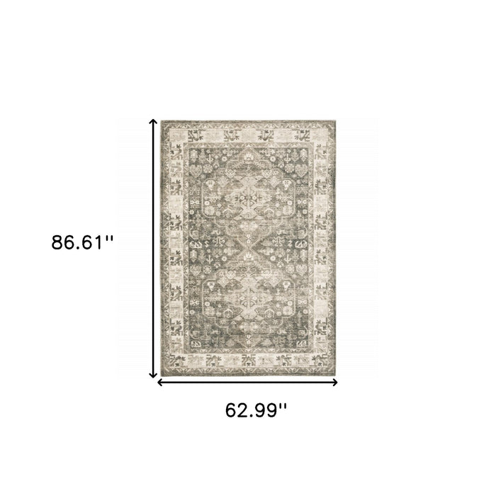 5' X 7' Grey Ivory Tan And Beige Oriental Power Loom Stain Resistant Area Rug