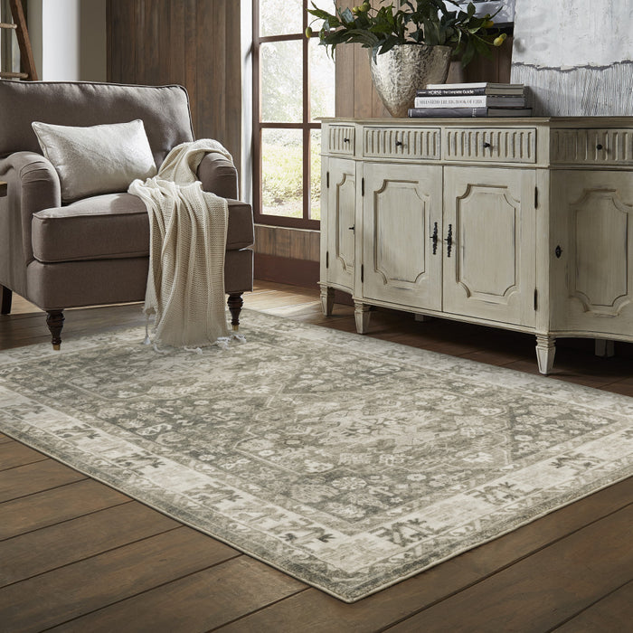 5' X 7' Grey Ivory Tan And Beige Oriental Power Loom Stain Resistant Area Rug