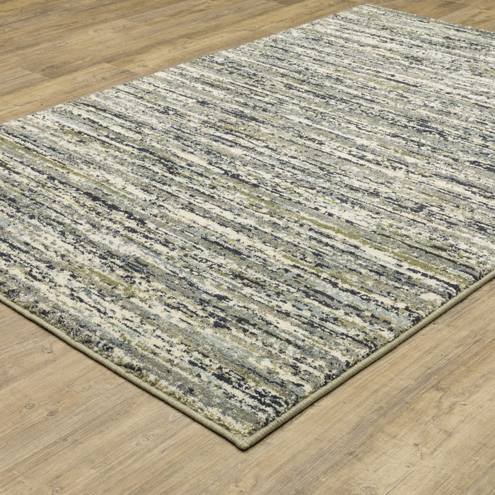 5' X 7' Blue Green Light Blue Grey And Ivory Abstract Power Loom Stain Resistant Area Rug