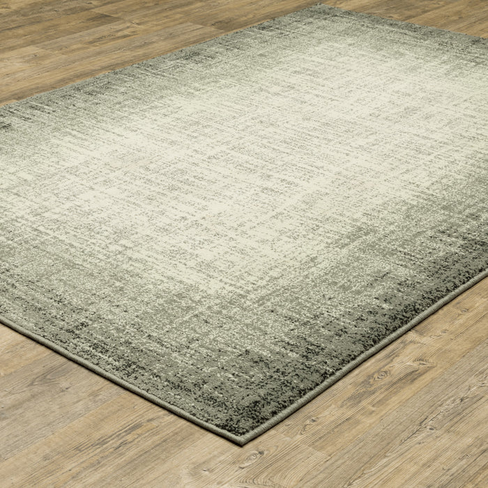 5' X 7' Grey Beige And Blue Power Loom Stain Resistant Area Rug