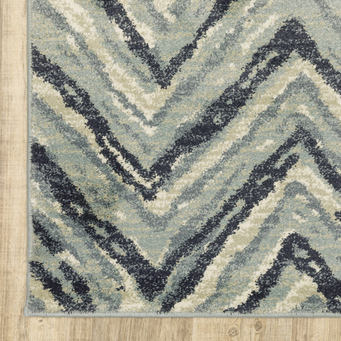 5' X 7' Blue Ivory Grey Beige And Light Blue Geometric Power Loom Stain Resistant Area Rug