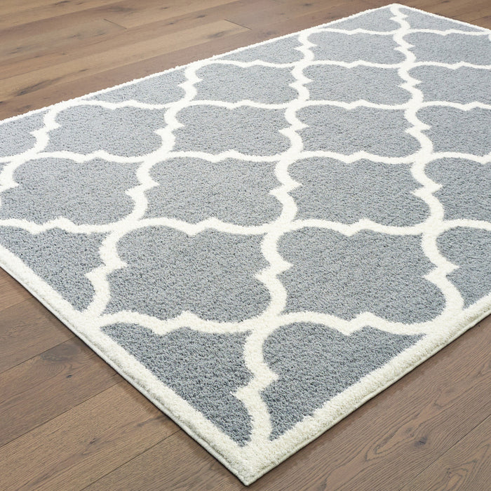 10' X 13' Grey And Ivory Geometric Shag Power Loom Stain Resistant Area Rug