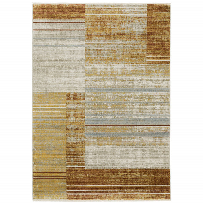 10' X 13' Rust Gold Blue Grey Ivory And Tan Geometric Power Loom Stain Resistant Area Rug With Fringe