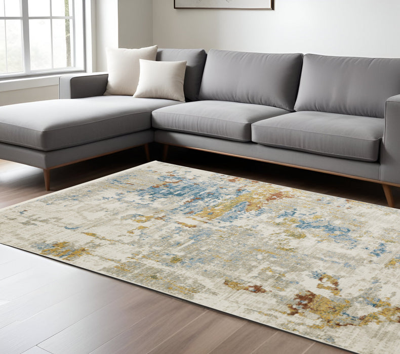 10' X 13' Blue and Beige Abstract Power Loom Area Rug With Fringe