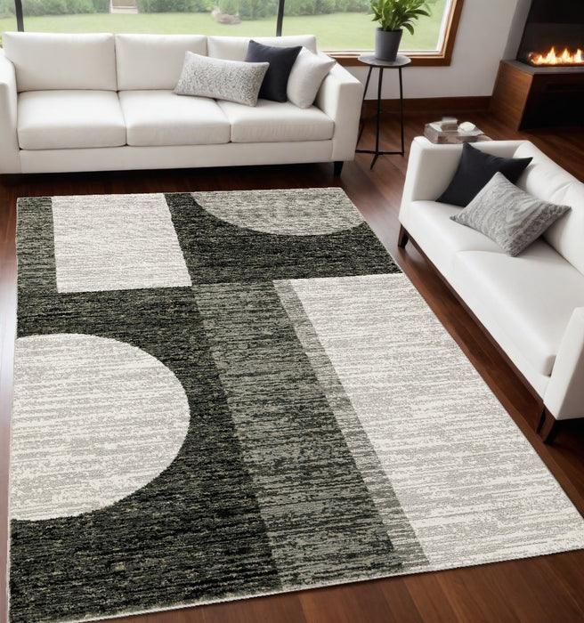 5' X 7' Gray and Ivory Geometric Power Loom Area Rug