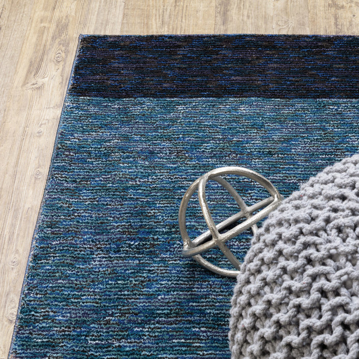 9' X 12' Blue Purple Grey and Teal Geometric Power Loom Area Rug