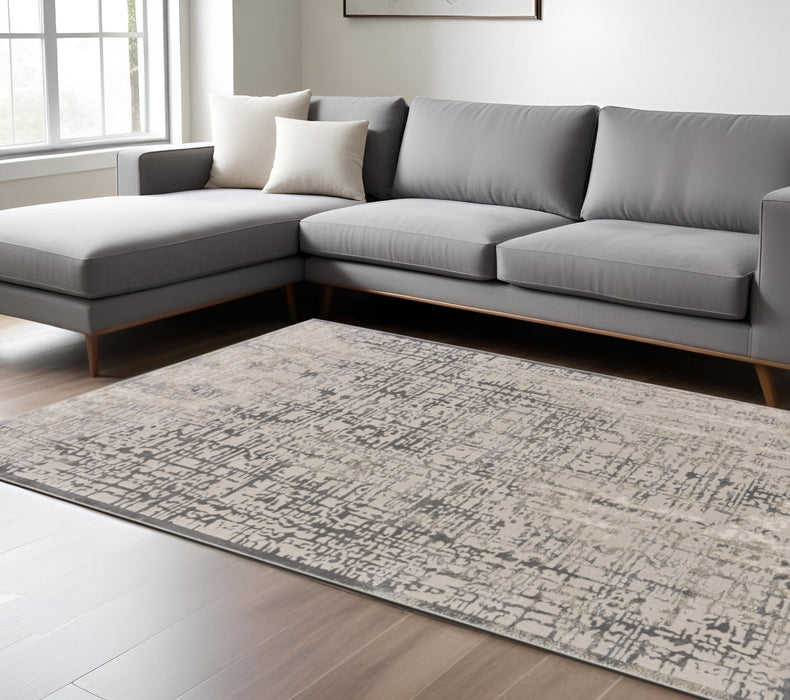 5' X 8' Gray And Ivory Abstract Stain Resistant Area Rug