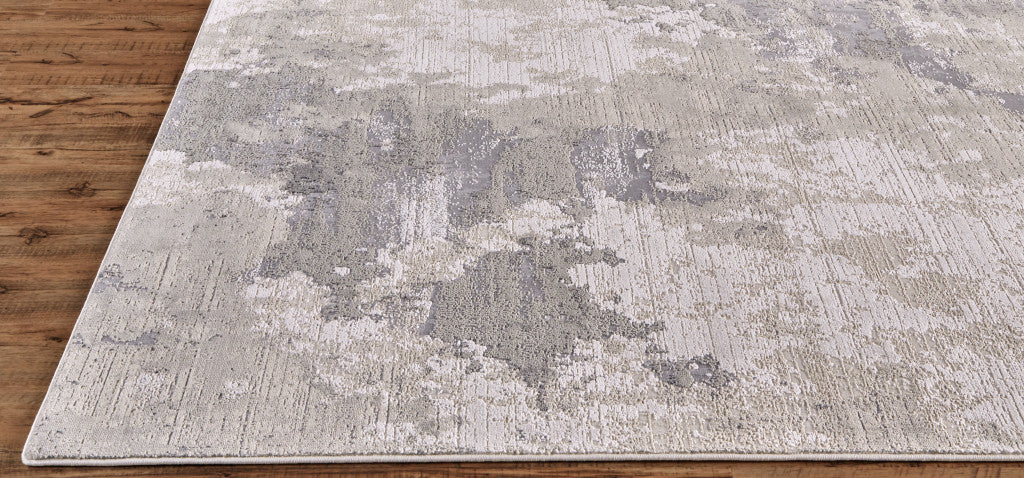 5' X 8' Ivory And Gray Abstract Stain Resistant Area Rug