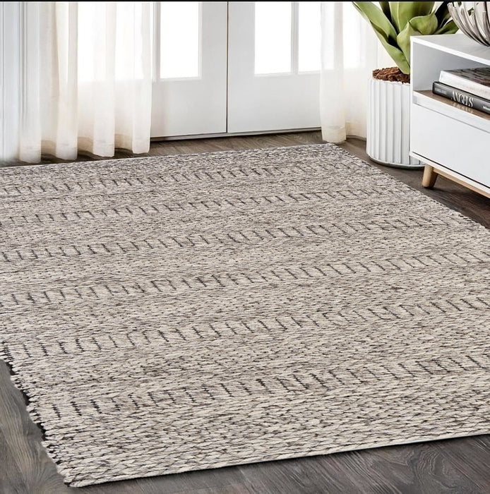 5' X 8' Gray and Ivory Wool Hand Woven Area Rug