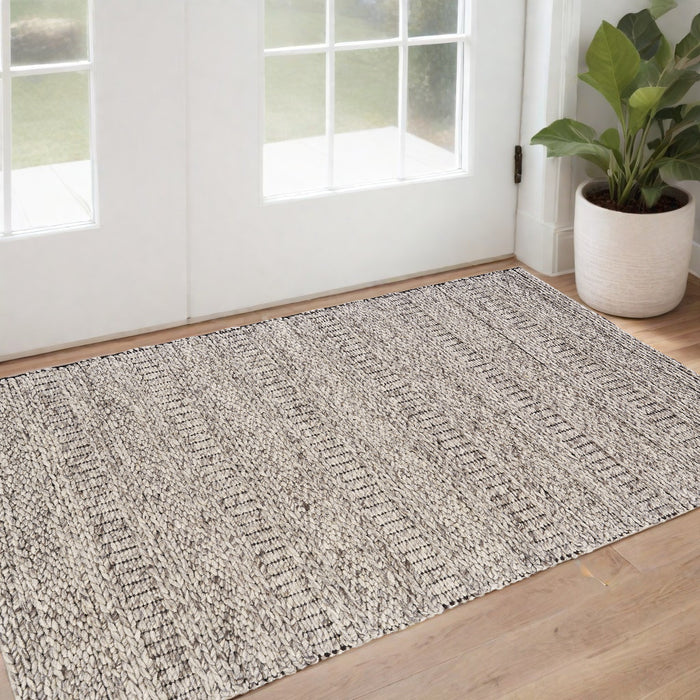 5' X 8' Gray and Ivory Wool Hand Woven Area Rug