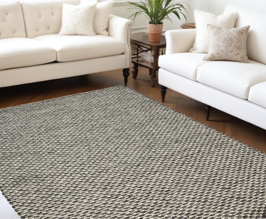 5' X 8' Gray and Ivory Wool Floral Hand Woven Area Rug