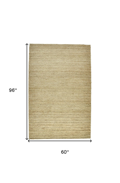 5' X 8' Tan Ivory And Taupe Hand Woven Area Rug