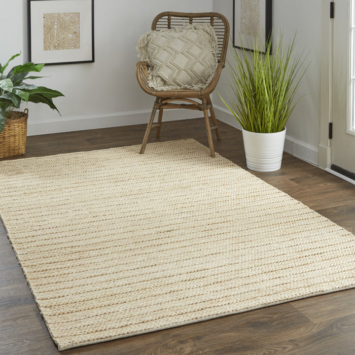 5' X 8' Tan Ivory And Taupe Hand Woven Area Rug