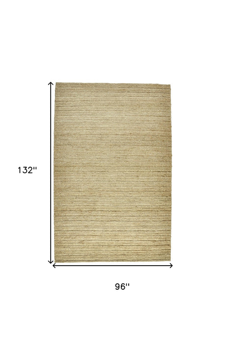 5' X 8' Tan Ivory And Taupe Hand Woven Area Rug