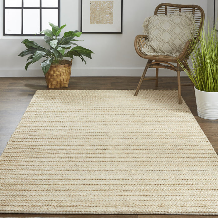 5' X 8' Tan Ivory And Taupe Hand Woven Area Rug