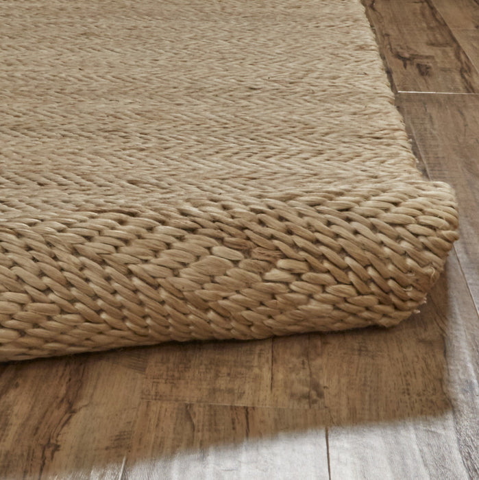 5' X 8' Tan And Gray Hand Woven Area Rug