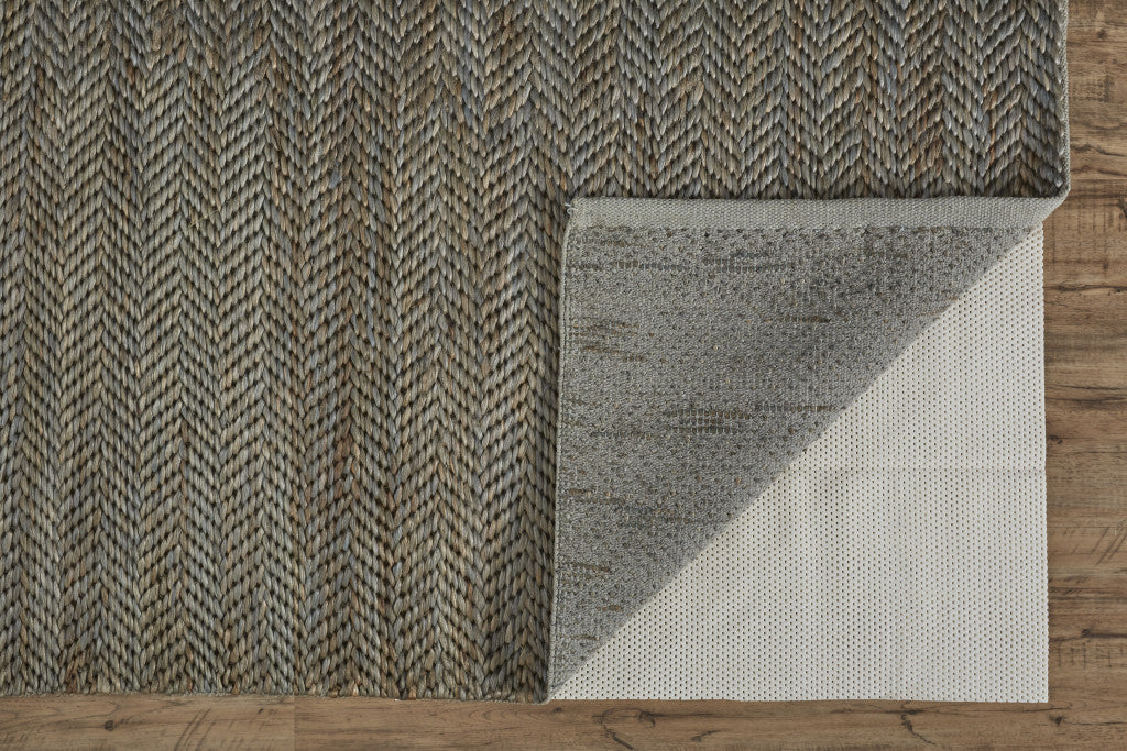 5' X 8' Tan And Gray Hand Woven Area Rug