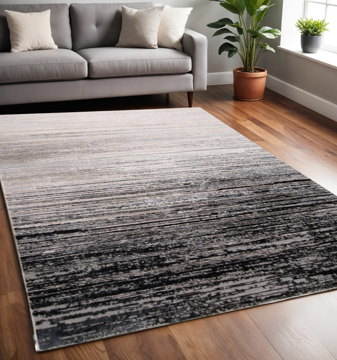 4' X 6' Beige and Black Abstract Non Skid Area Rug