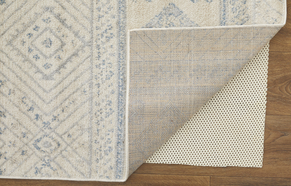 8' X 10' Ivory And Blue Geometric Power Loom Distressed Area Rug