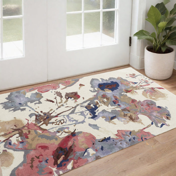 4' X 6' Ivory and Blue Wool Floral Hand Tufted Area Rug