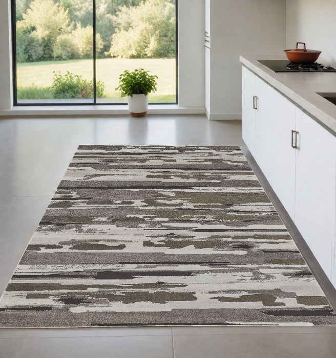 4' X 6' Gray and Ivory Abstract Power Loom Distressed Area Rug