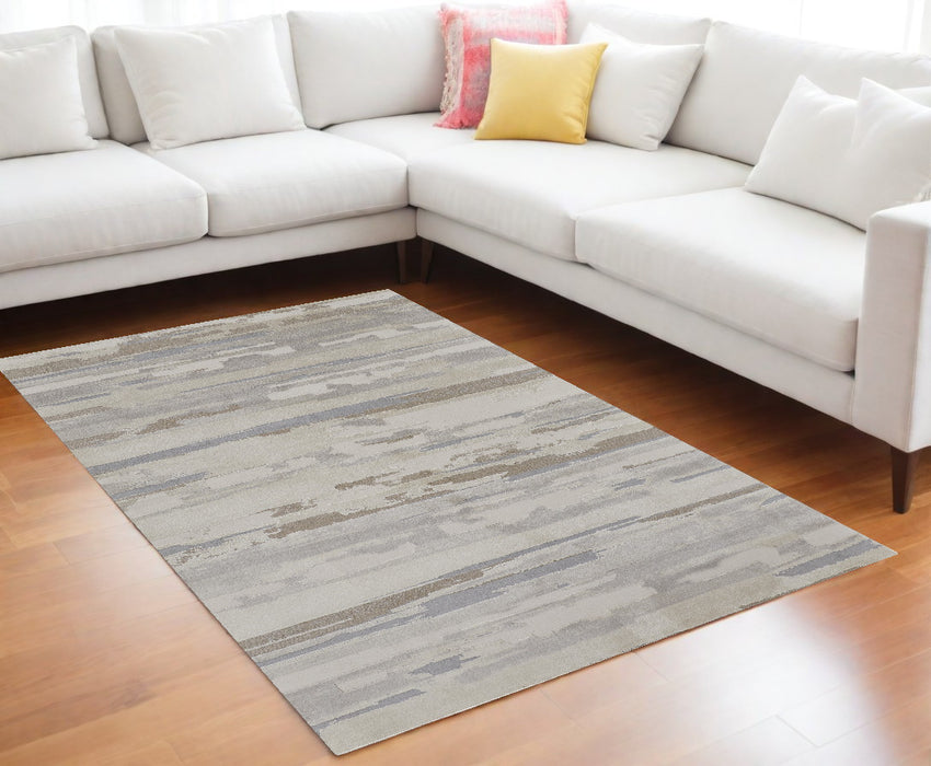 4' X 6' Gray and Ivory Abstract Power Loom Distressed Area Rug