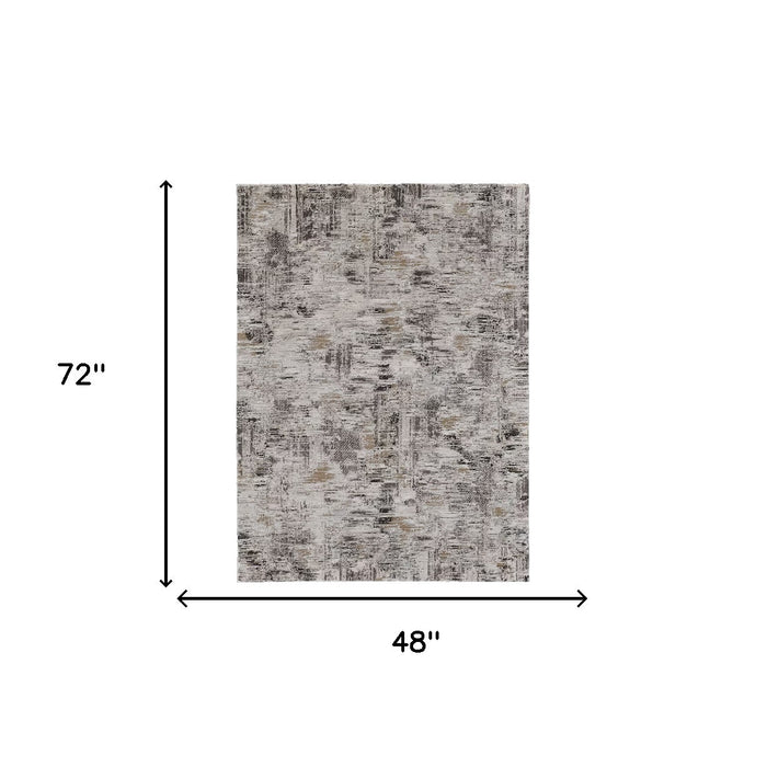 4' X 6' Gray and Ivory Abstract Power Loom Distressed Area Rug