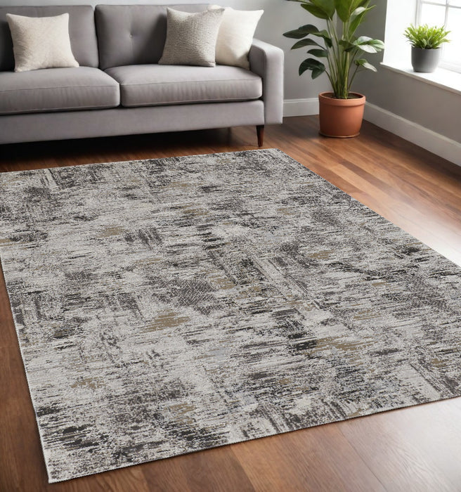 4' X 6' Gray and Ivory Abstract Power Loom Distressed Area Rug