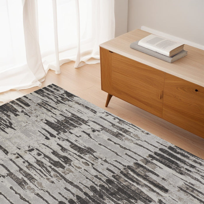 4' X 6' Gray and Ivory Abstract Power Loom Area Rug