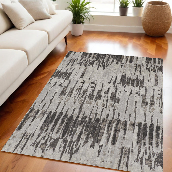 4' X 6' Gray and Ivory Abstract Power Loom Area Rug