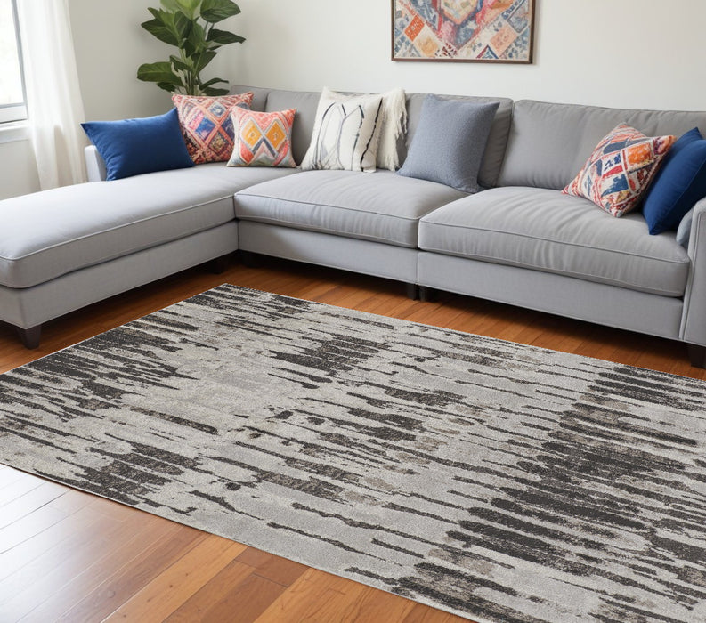 4' X 6' Gray and Ivory Abstract Power Loom Area Rug