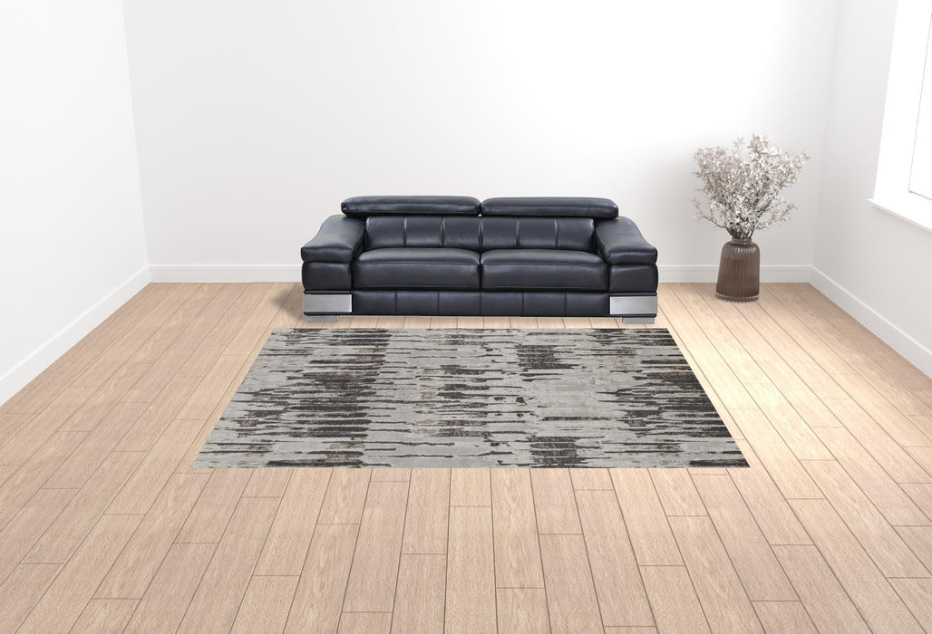 4' X 6' Gray and Ivory Abstract Power Loom Area Rug