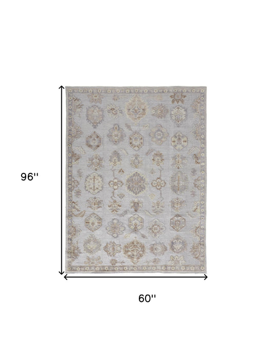 4' X 6' Ivory Silver And Tan Floral Hand Knotted Stain Resistant Area Rug