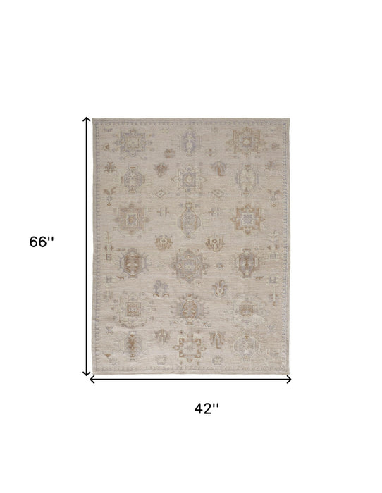 4' X 6' Tan And Brown Floral Hand Knotted Stain Resistant Area Rug